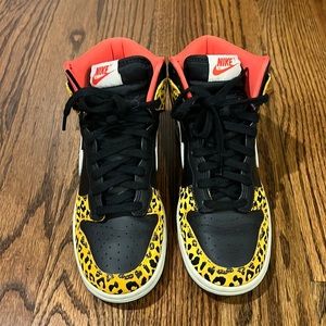 Nike women’s size 6 high top dunk with a leopard print. No box. Worn once